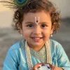 Cute Baby Krishna Holding Makhan HD Portrait